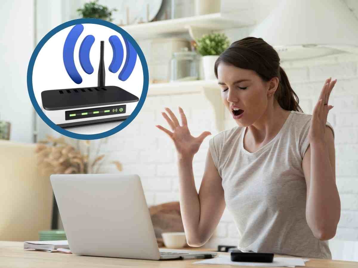 Donna arrabbiata al pc e router wi-fi